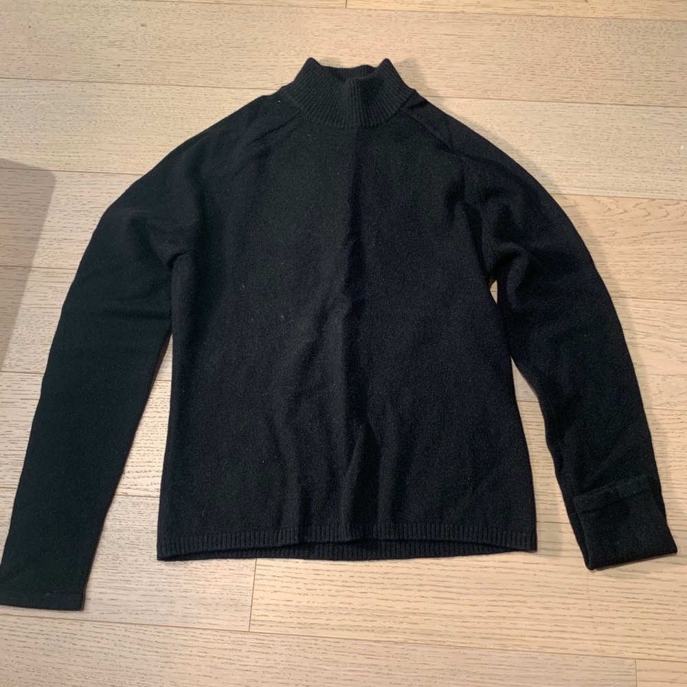 Black cashmere turtleneck sweater.